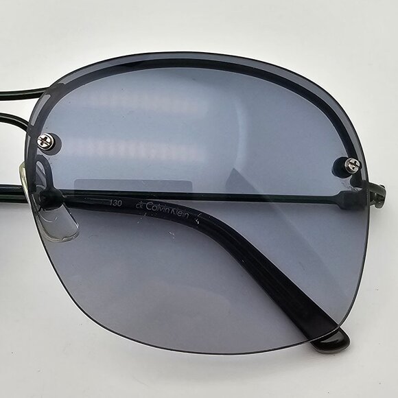 Calvin Klein CK2122S 109 Green Frame Blue Gradient Lens...